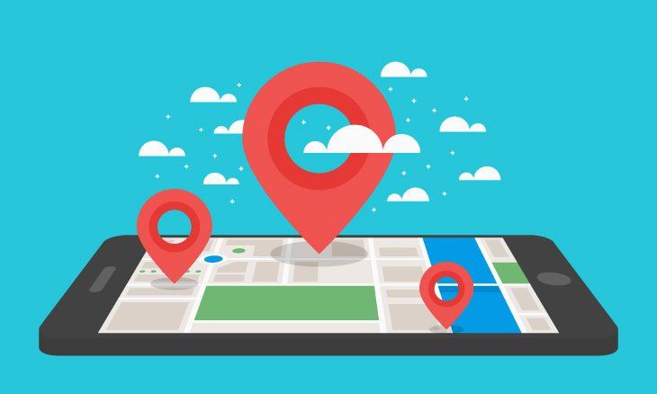 Smartphone avec logo de géolocalisation.